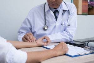 Doctor consulting a patient about intensive outpatient therapy