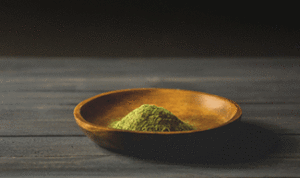A bowl of kratom powder