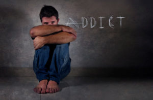 Opioid addict sitting down