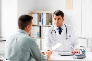 Doctor talking to patient about why he feels being sober sucks