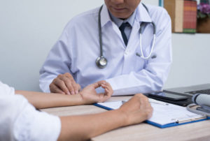Doctor consulting a patient about intensive outpatient therapy