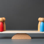 Two opposing teams on the scales. Rivalry between groups and leaders. The state and parties. Two major political parties. Democratic elections.