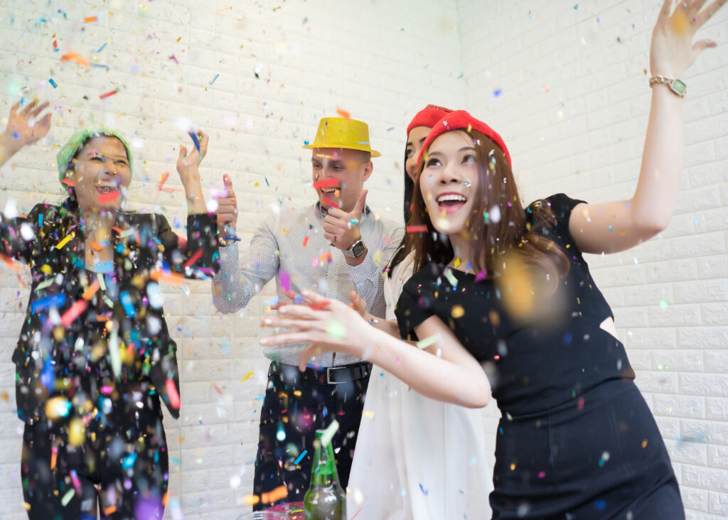 Happy business group people in santa hat having fun for celebrity christmas party.