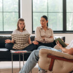 Bad family relationships. Mother with her daughter are at psychologist appointment.