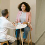 young woman consulting her treatment plan